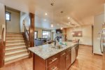 Entertain family on the front balcony while cooking in the kitchen